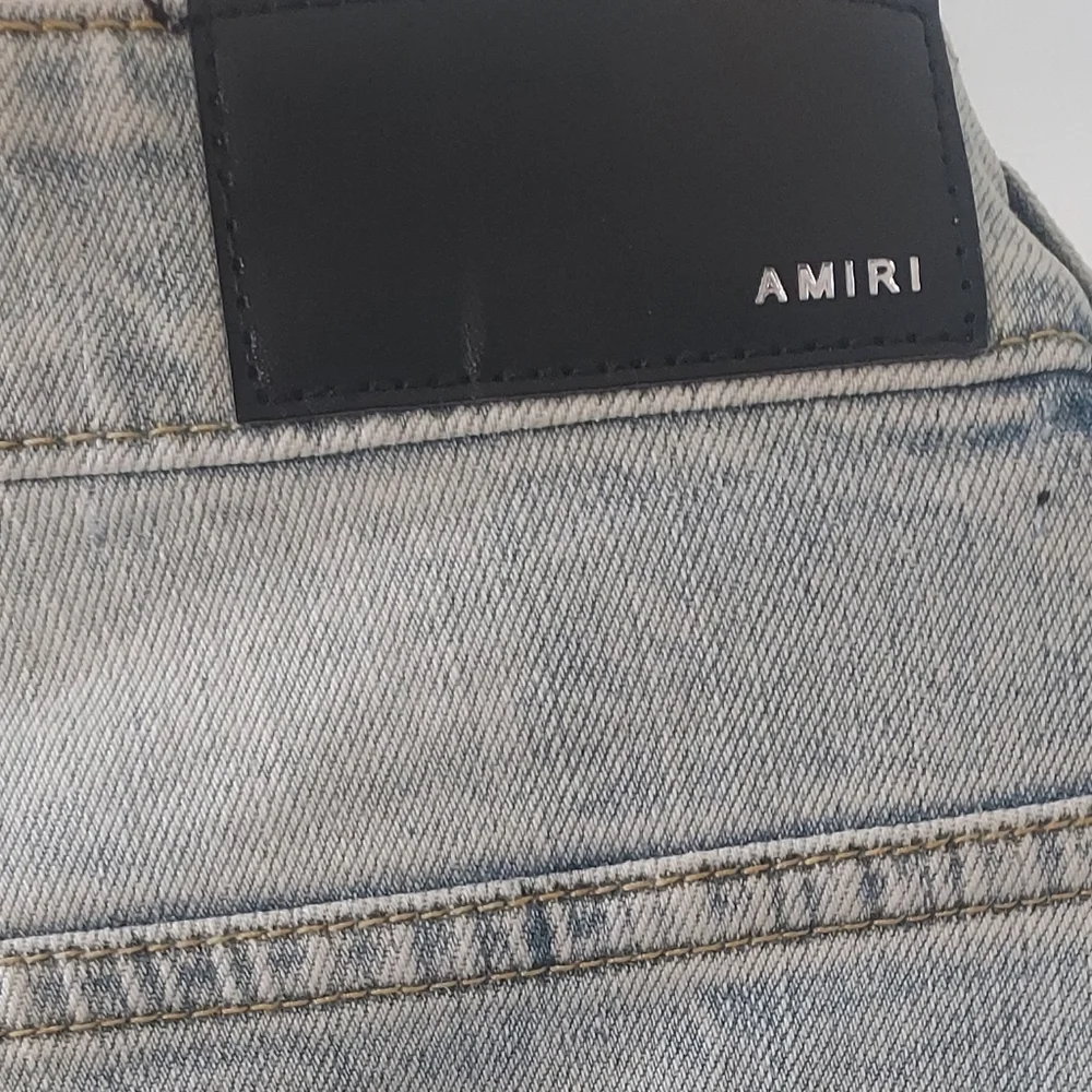 AMIRI Mens Exclusive Designer Jeans with Front Distressing